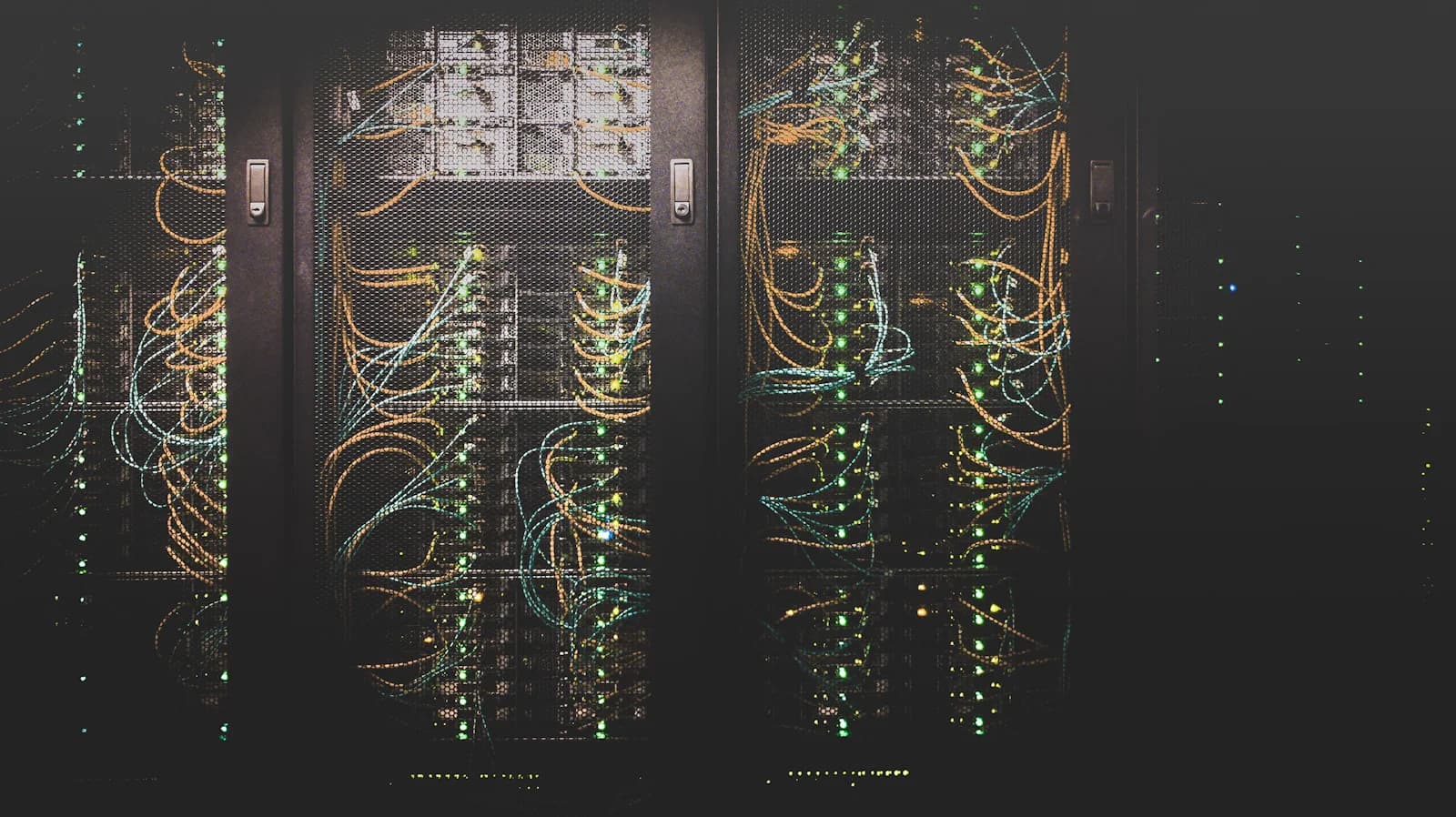 Engineers managing enterprise IT infrastructure in a modern server room