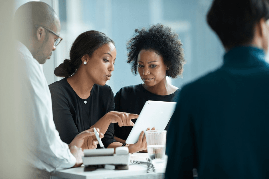 Black software development team collaborating on application architecture in a Lagos office
